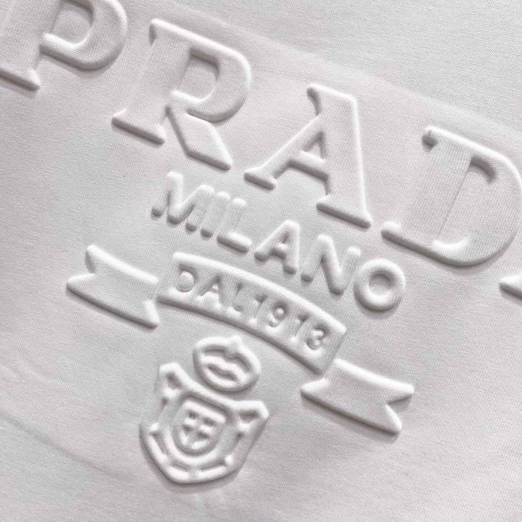 Three-dimensional embossed letter T-shirt