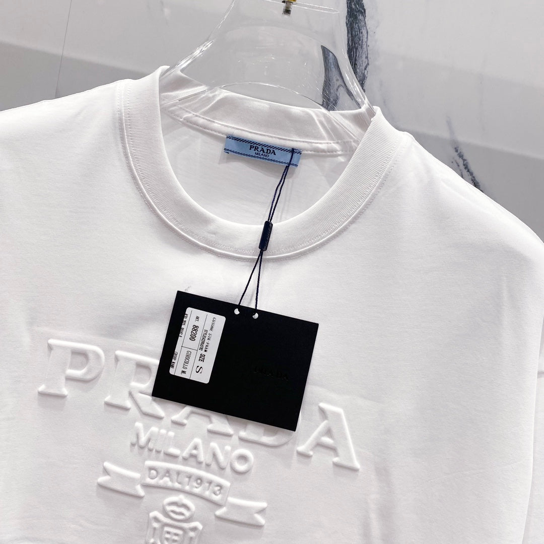 Three-dimensional embossed letter T-shirt