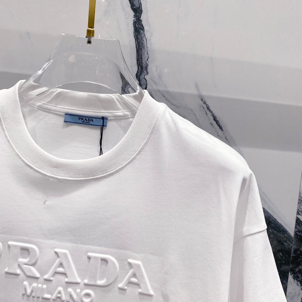 Three-dimensional embossed letter T-shirt